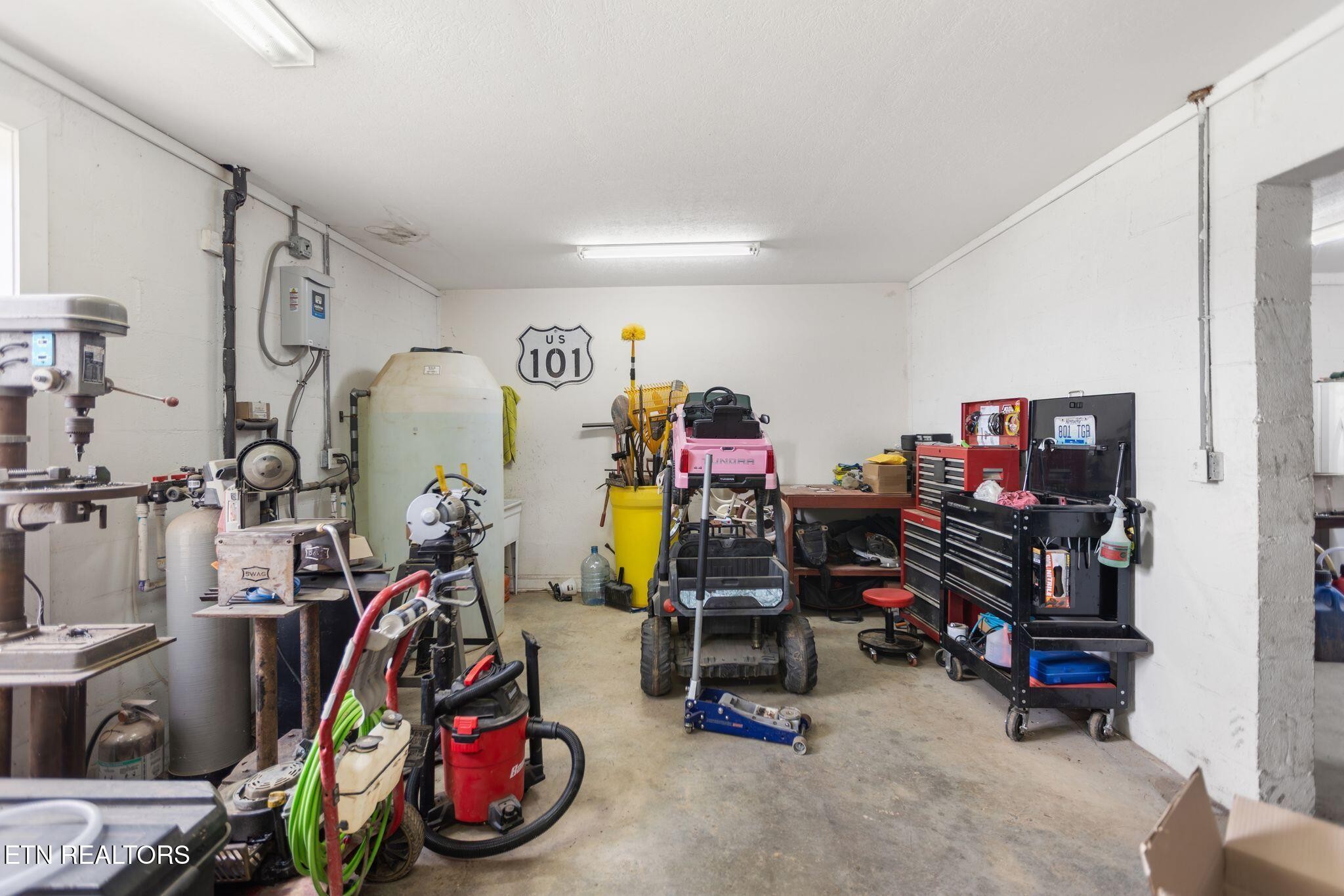 741 Clinch Valley Road Powder Springs, TN 37848 - Photo 36 of 50 a view of a garage with toys