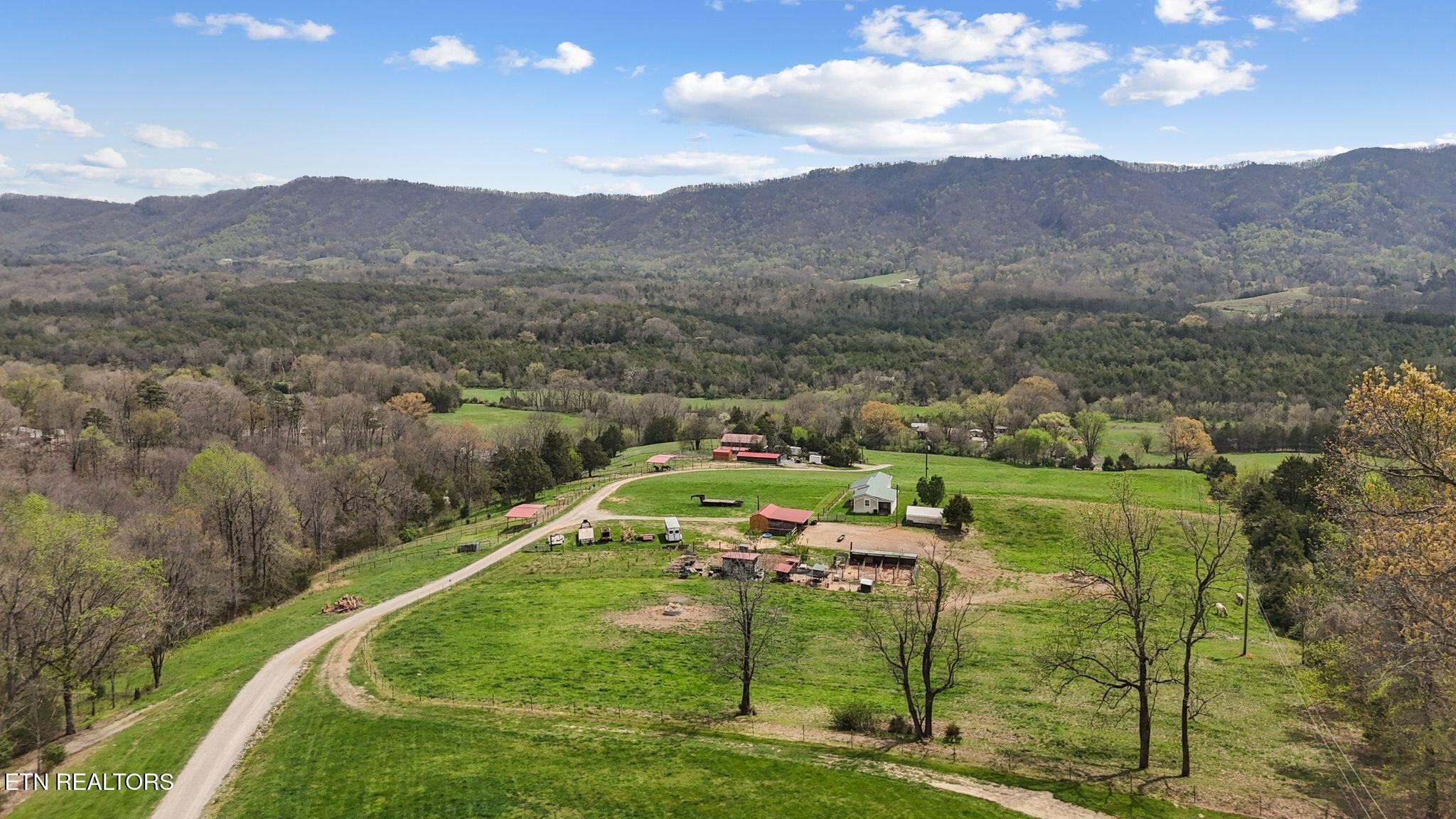 741 Clinch Valley Road Powder Springs, TN 37848 - Photo 39 of 50 a view of a house with a yard
