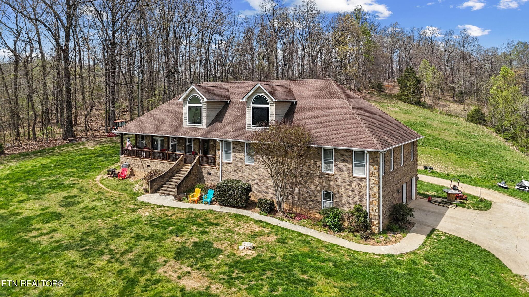 741 Clinch Valley Road Powder Springs, TN 37848 - Photo 5 of 50 a aerial view of a house