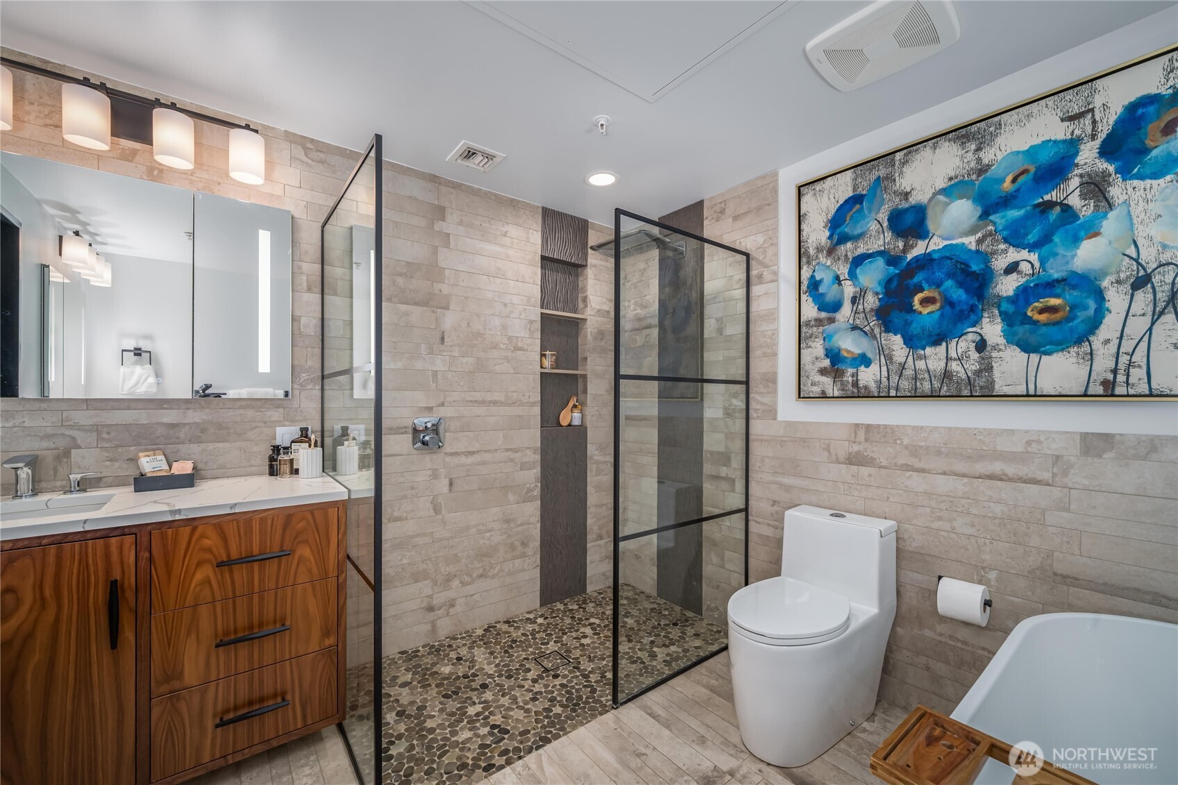 615 East Pike Street, Unit 303 Seattle, WA 98122 - Photo 21 of 40 a bathroom with a toilet sink and shower