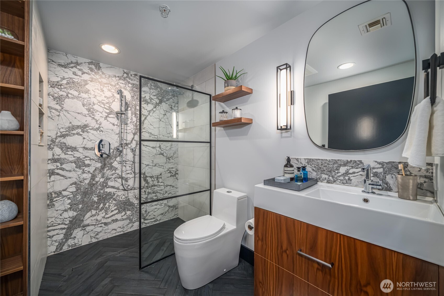 615 East Pike Street, Unit 303 Seattle, WA 98122 - Photo 28 of 40 a bathroom with a sink toilet and shower