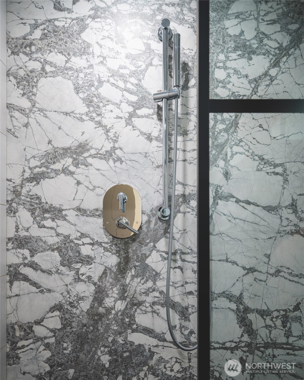 615 East Pike Street, Unit 303 Seattle, WA 98122 - Photo 29 of 40 a bathroom with a granite countertop shower and a mirror