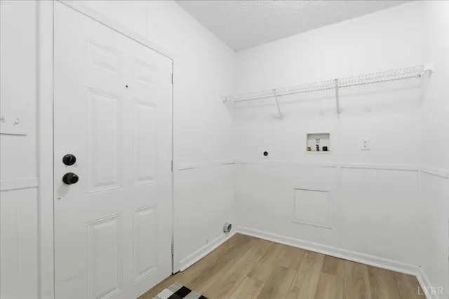 a view of a room with racks on the wall