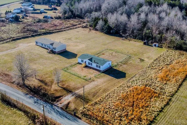 a view of a backyard of the house