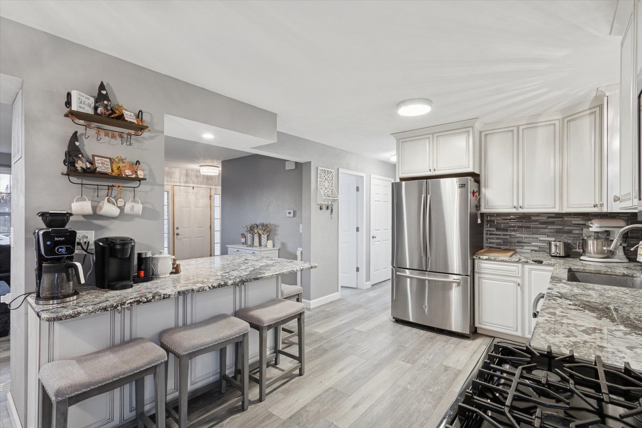 549 Bayfield Road Rockton, IL 61073 - Photo 14 of 47 a kitchen with refrigerator and cabinets