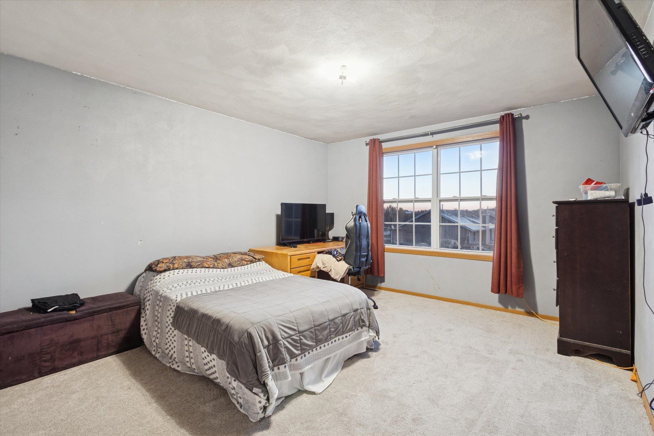 549 Bayfield Road Rockton, IL 61073 - Photo 22 of 47 a bedroom with a bed and a flat tv screen