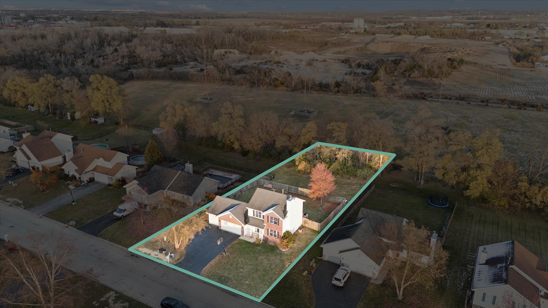 549 Bayfield Road Rockton, IL 61073 - Photo 47 of 47 an aerial view of a house with a yard