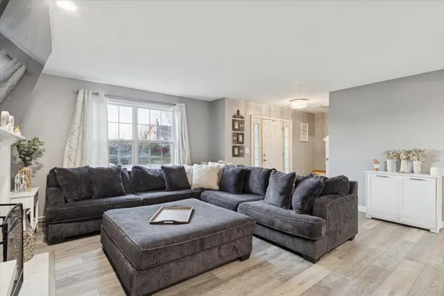 a living room with furniture and a couch