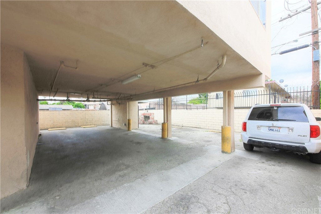 14224 Erwin Street Van Nuys, CA 91401 - Photo 11 of 18 a view of parking area