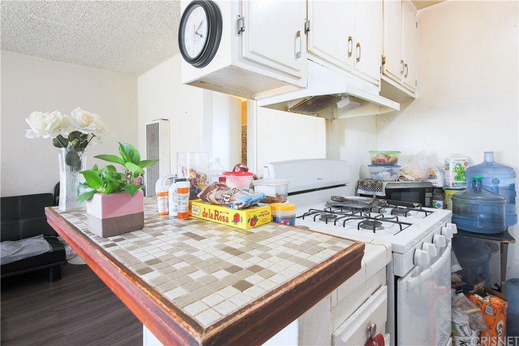 14224 Erwin Street Van Nuys, CA 91401 - Photo 18 of 18 a kitchen with a table and chairs