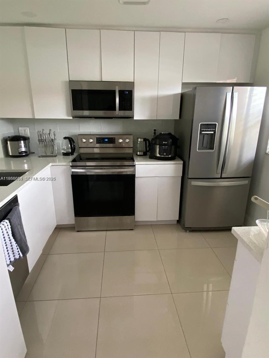 8838 West McNab Road, Unit 104 Tamarac, FL 33321 - Photo 3 of 23