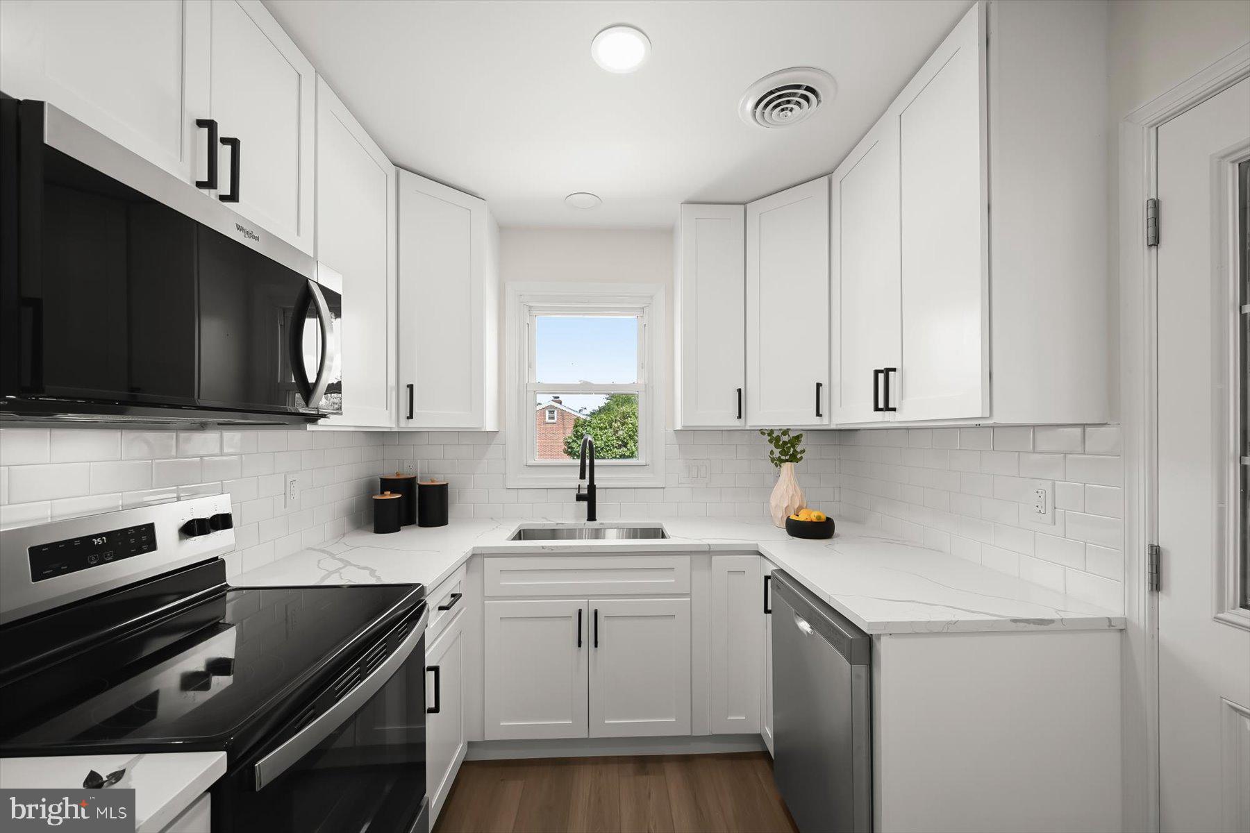 8475 Byrd Road Pasadena, MD 21122 - Photo 7 of 30 New appliances and quartz counters