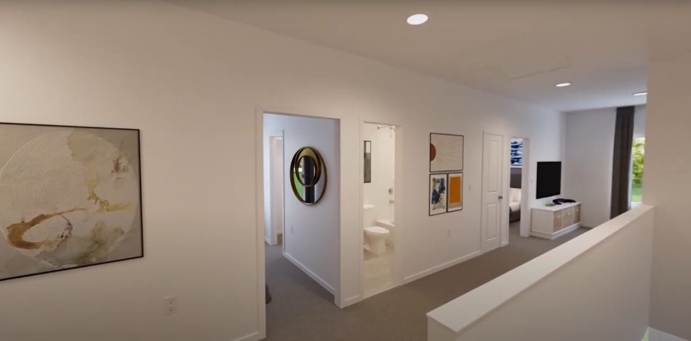2163 Salinas Drive Rosharon, TX 77583 - Photo 21 of 31 a view of a hallway with bathroom and mirror