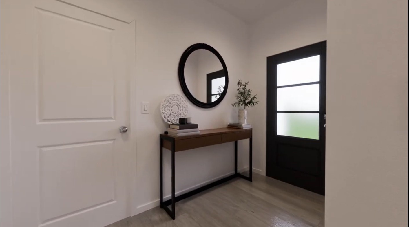2163 Salinas Drive Rosharon, TX 77583 - Photo 12 of 31 a bathroom with a sink a mirror and a window