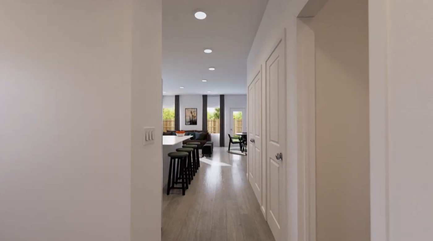 2163 Salinas Drive Rosharon, TX 77583 - Photo 15 of 31 a view of a hallway with a white stove next to a window