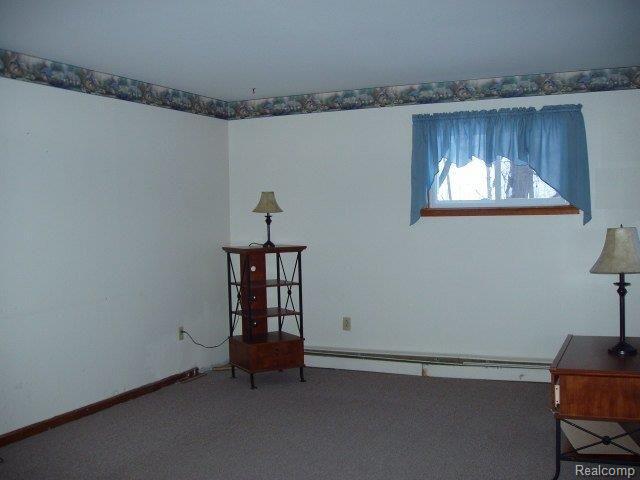 5217 Kidder Road Almont, MI 48003 - Photo 2 of 4 Kidder Living Room Almont MI 480