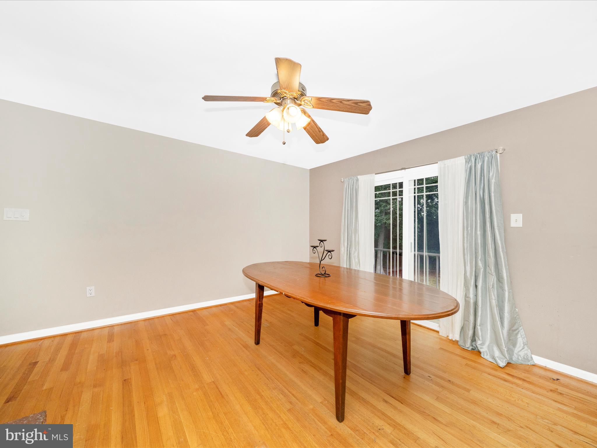 7019 Fitzpatrick Drive Laurel, MD 20707 - Photo 22 of 59 a view of a room with a table and chairs