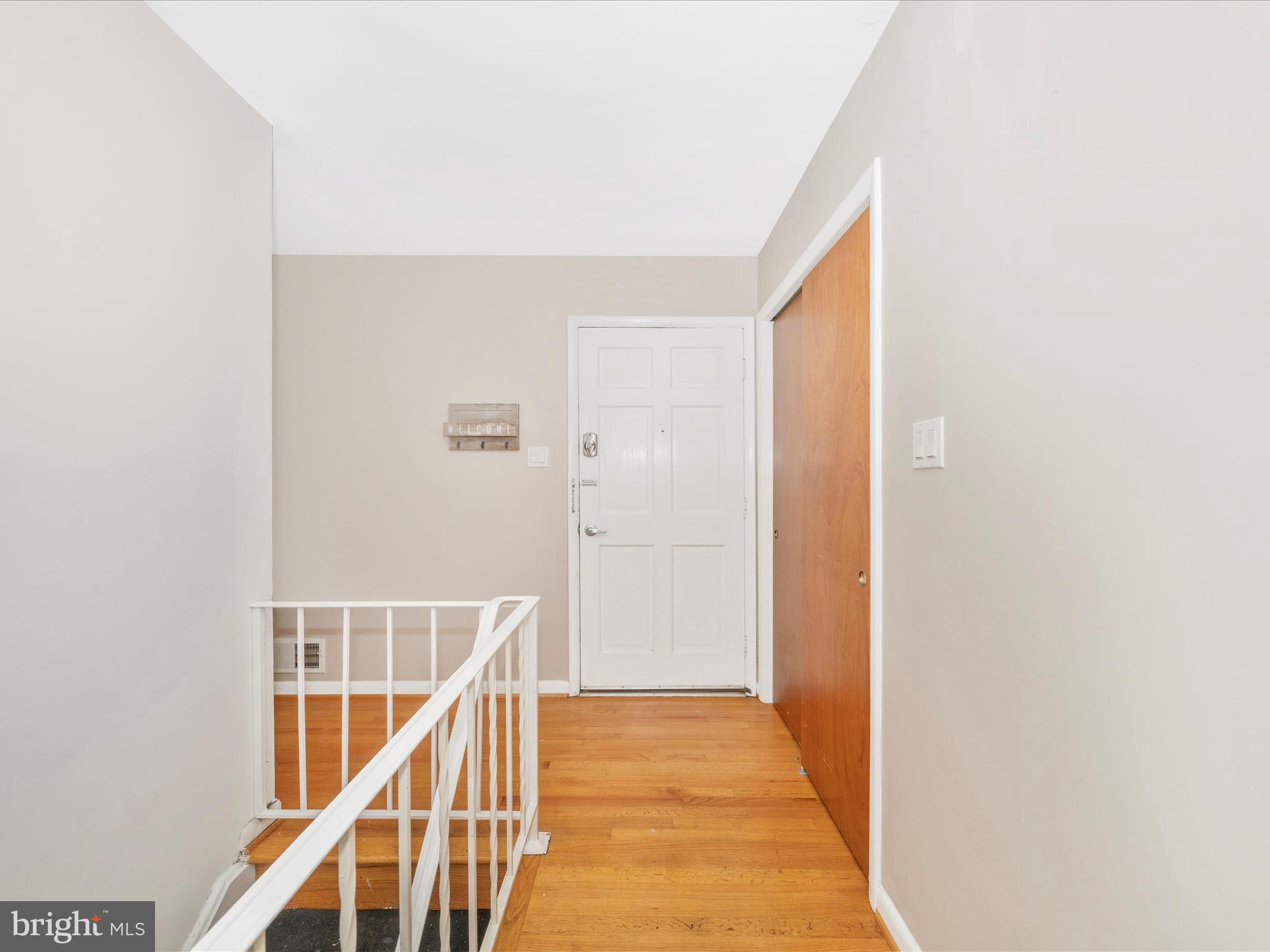 7019 Fitzpatrick Drive Laurel, MD 20707 - Photo 3 of 59 a view of a hallway with an entryway