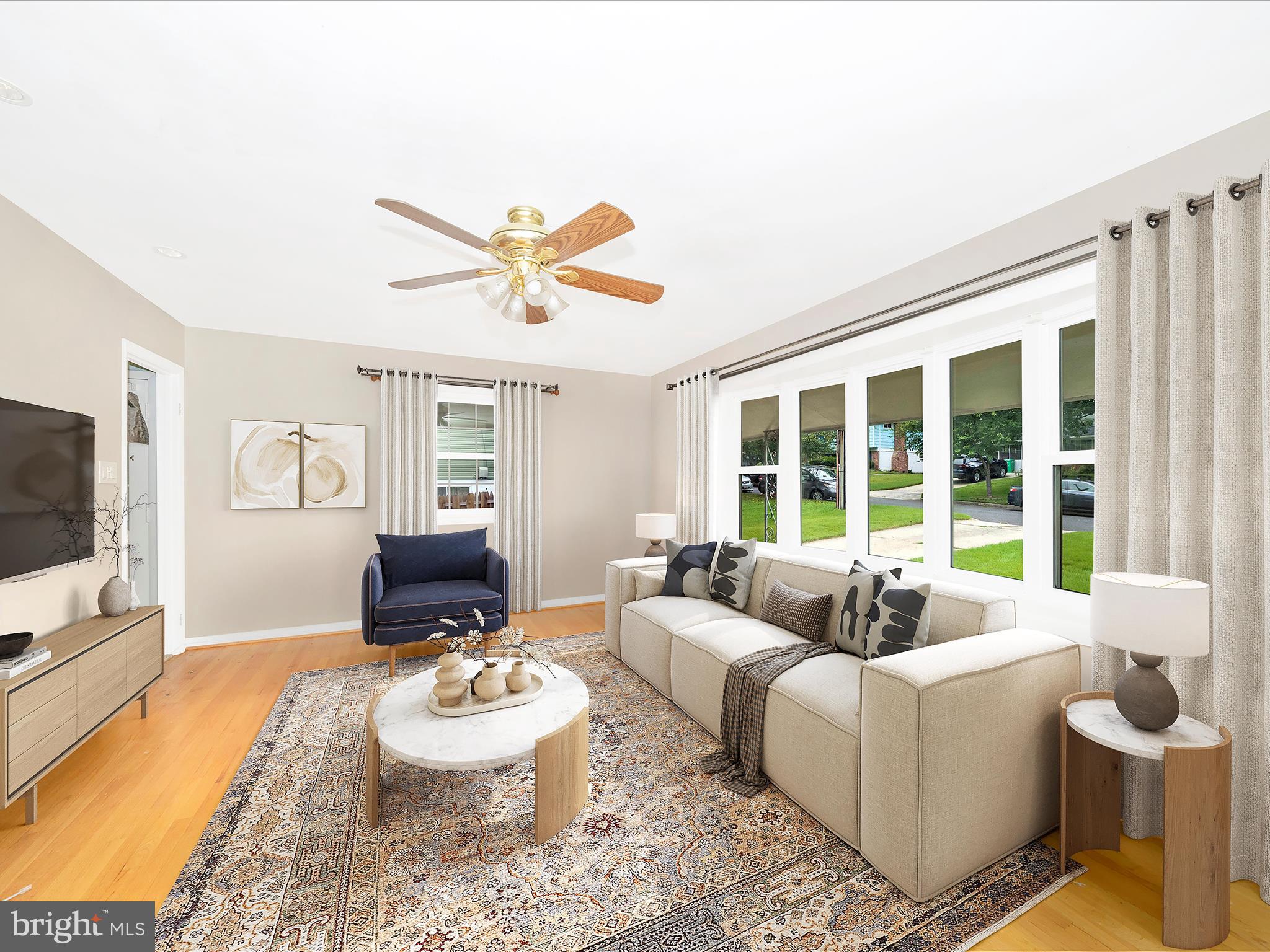 7019 Fitzpatrick Drive Laurel, MD 20707 - Photo 4 of 59 a living room with furniture and a flat screen tv