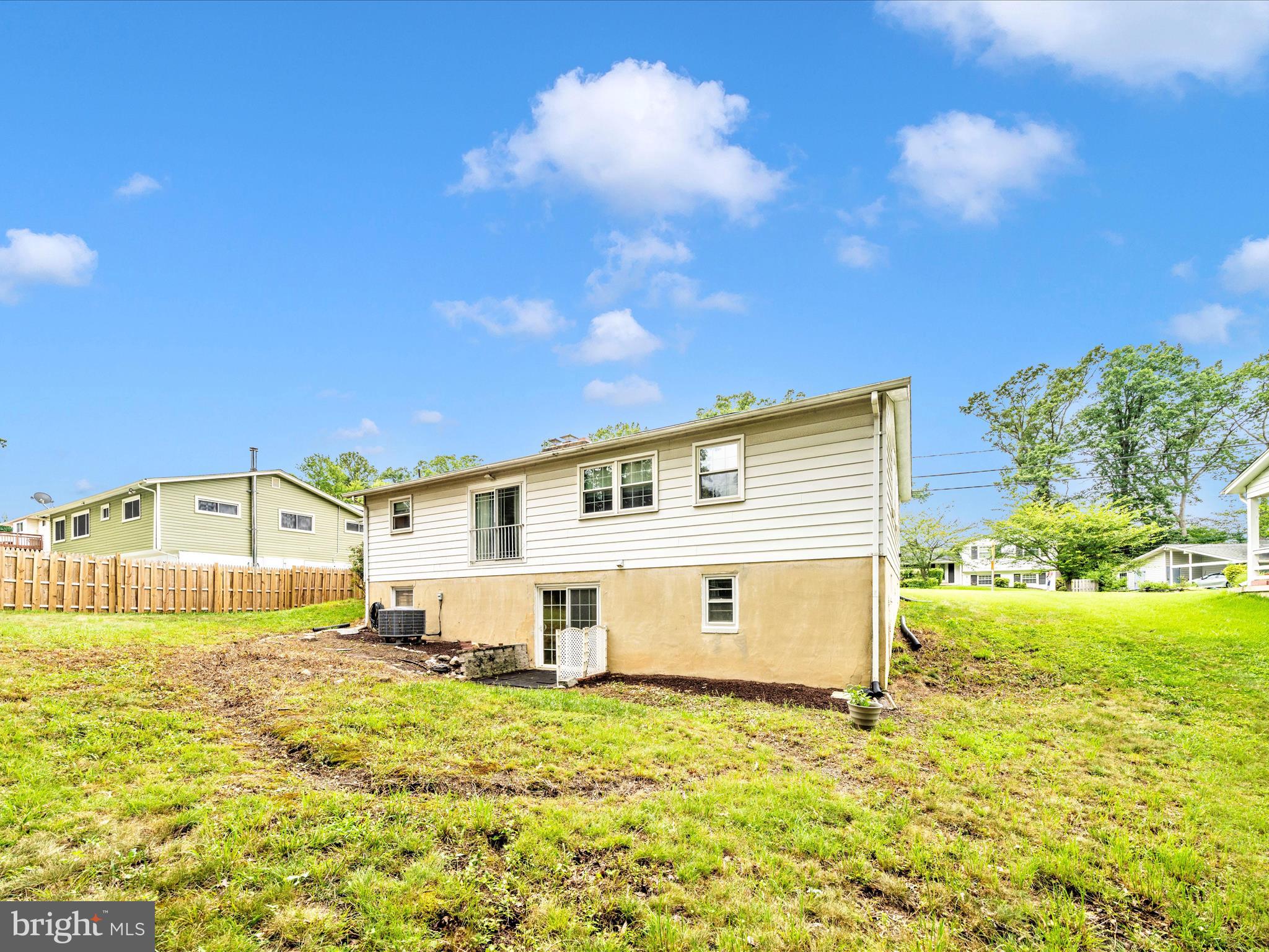 7019 Fitzpatrick Drive Laurel, MD 20707 - Photo 49 of 59 a front view of a house with a yard