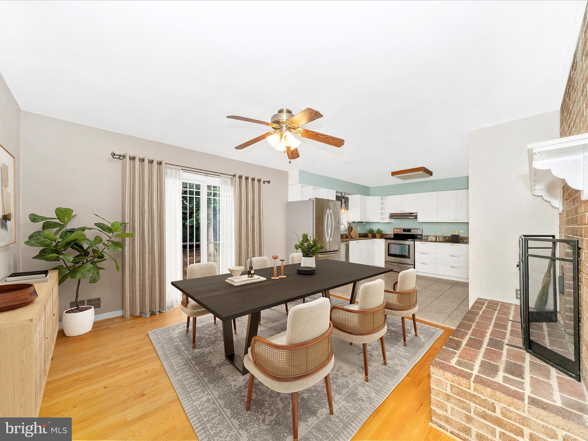 7019 Fitzpatrick Drive Laurel, MD 20707 - Photo 5 of 59 a view of a dining room with furniture window and wooden floor