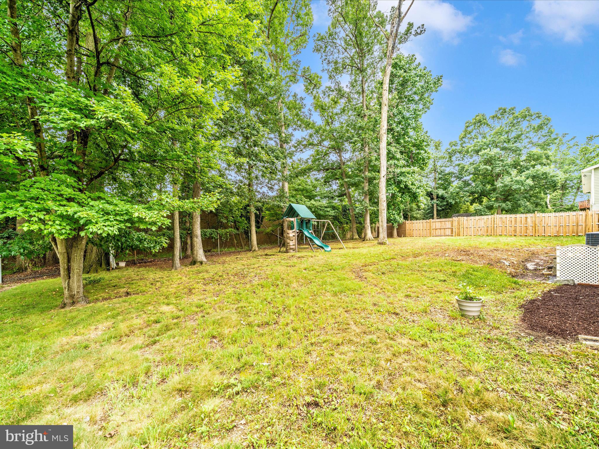 7019 Fitzpatrick Drive Laurel, MD 20707 - Photo 54 of 59 a house with swimming pool in front of it