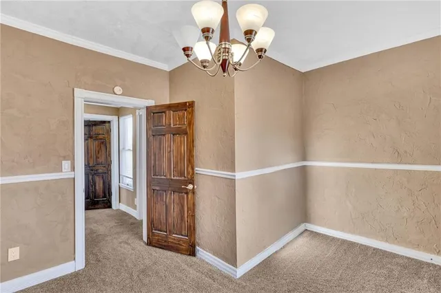 a view of a livingroom with a chandelier