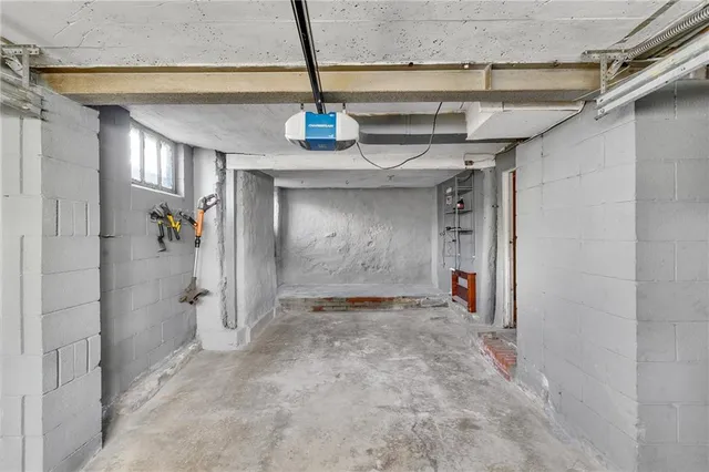 a dining room with furniture and front door