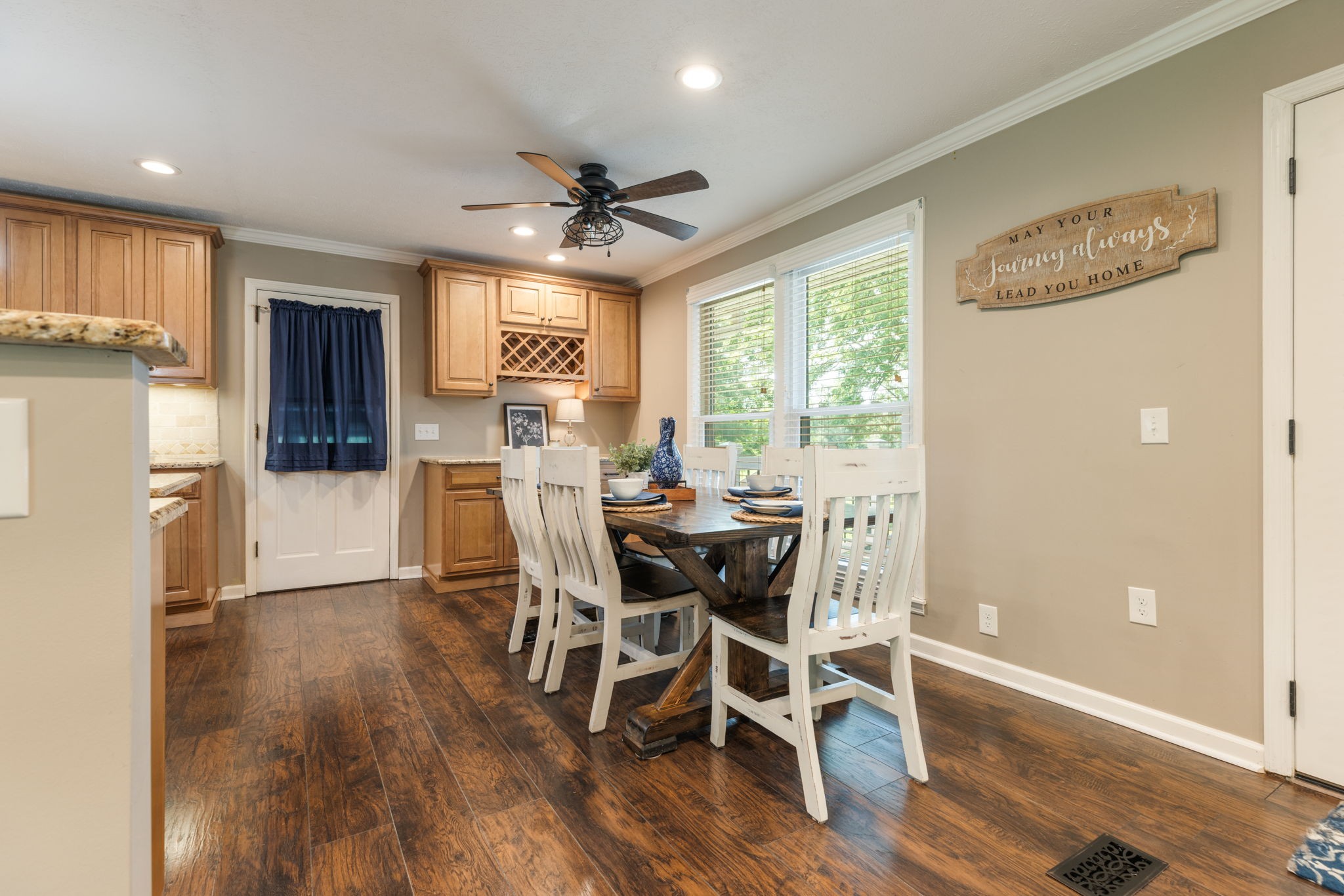 7367 Crow Cut Road Fairview, TN 37062 - Photo 20 of 96 a view of a dining room with furniture window and wooden floor