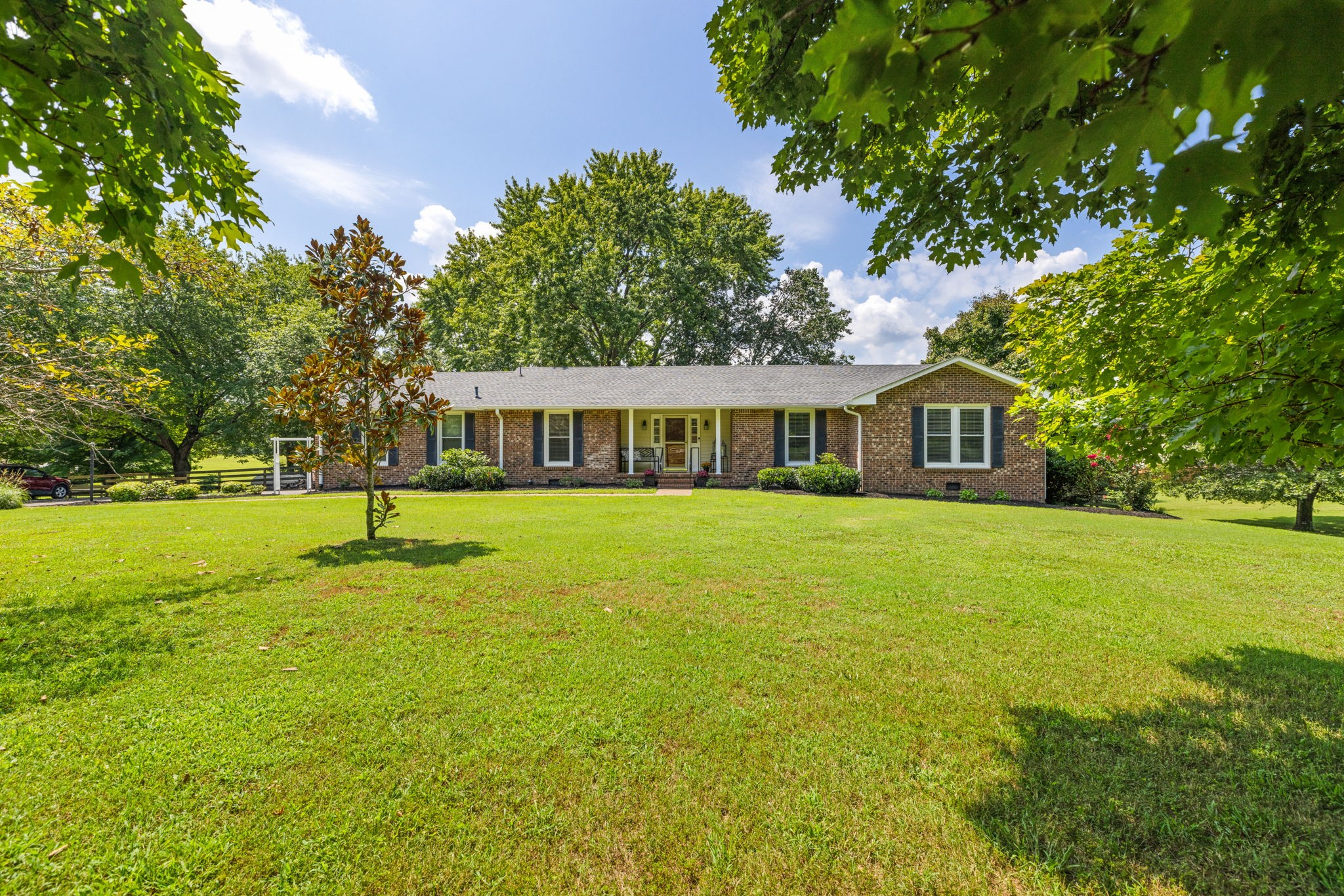 7367 Crow Cut Road Fairview, TN 37062 - Photo 2 of 96 a front view of house with yard and green space