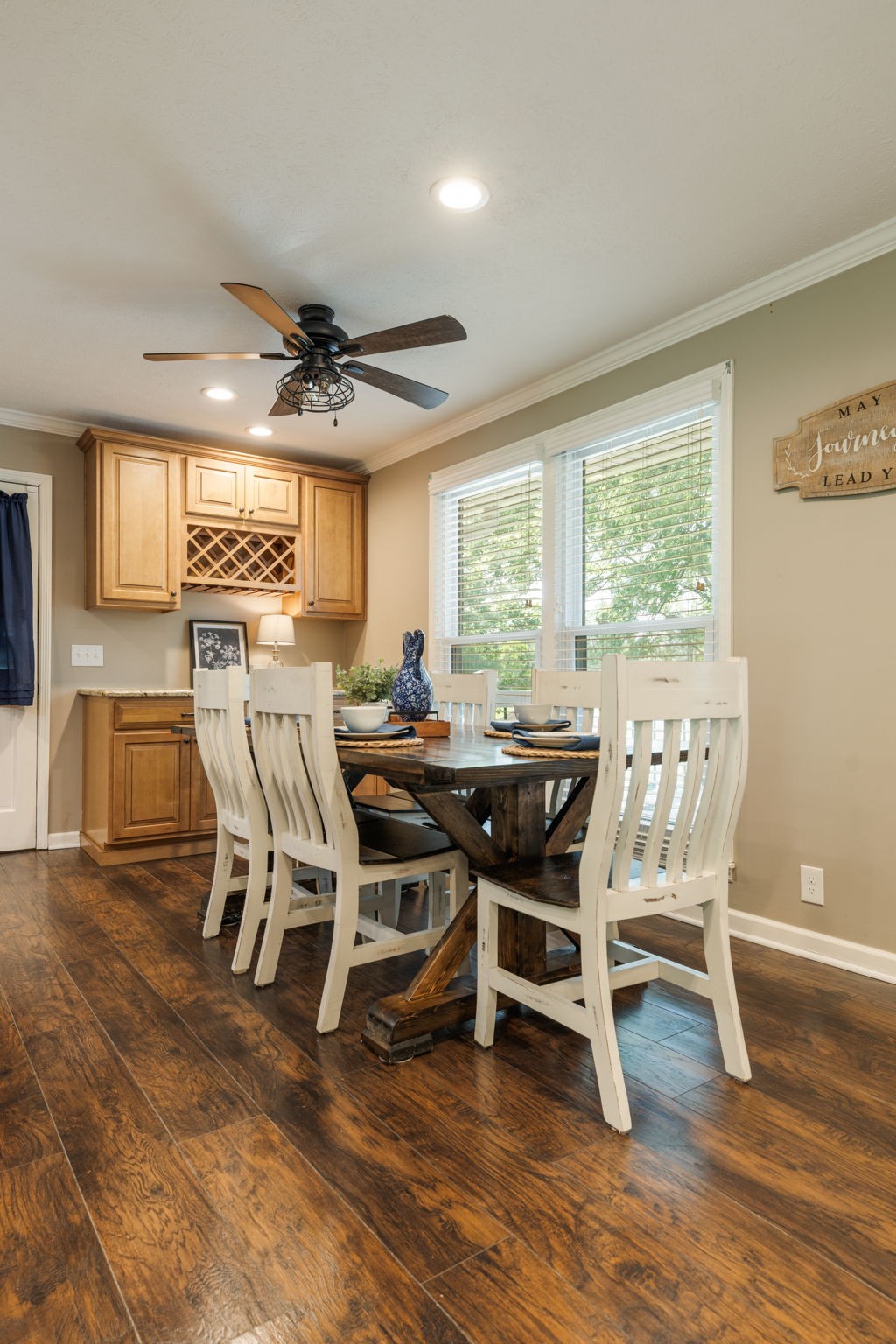 7367 Crow Cut Road Fairview, TN 37062 - Photo 21 of 96 a dining room with furniture and wooden floor