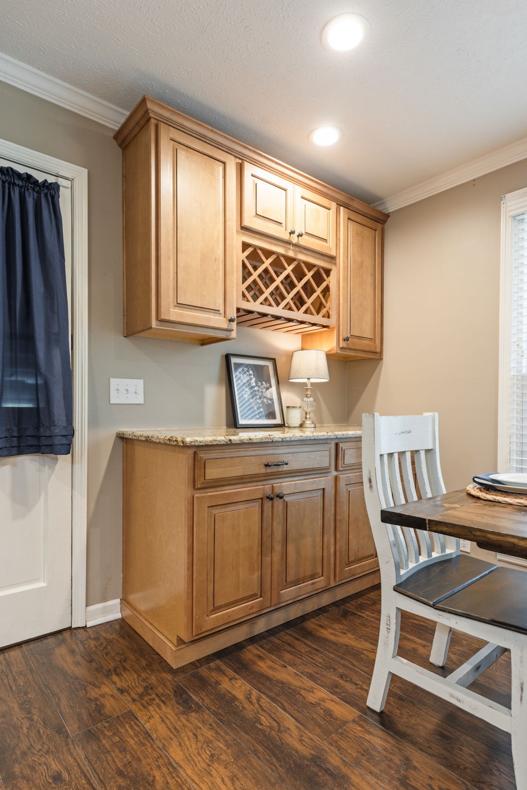 7367 Crow Cut Road Fairview, TN 37062 - Photo 26 of 96 a kitchen with granite countertop a stove a sink and a refrigerator