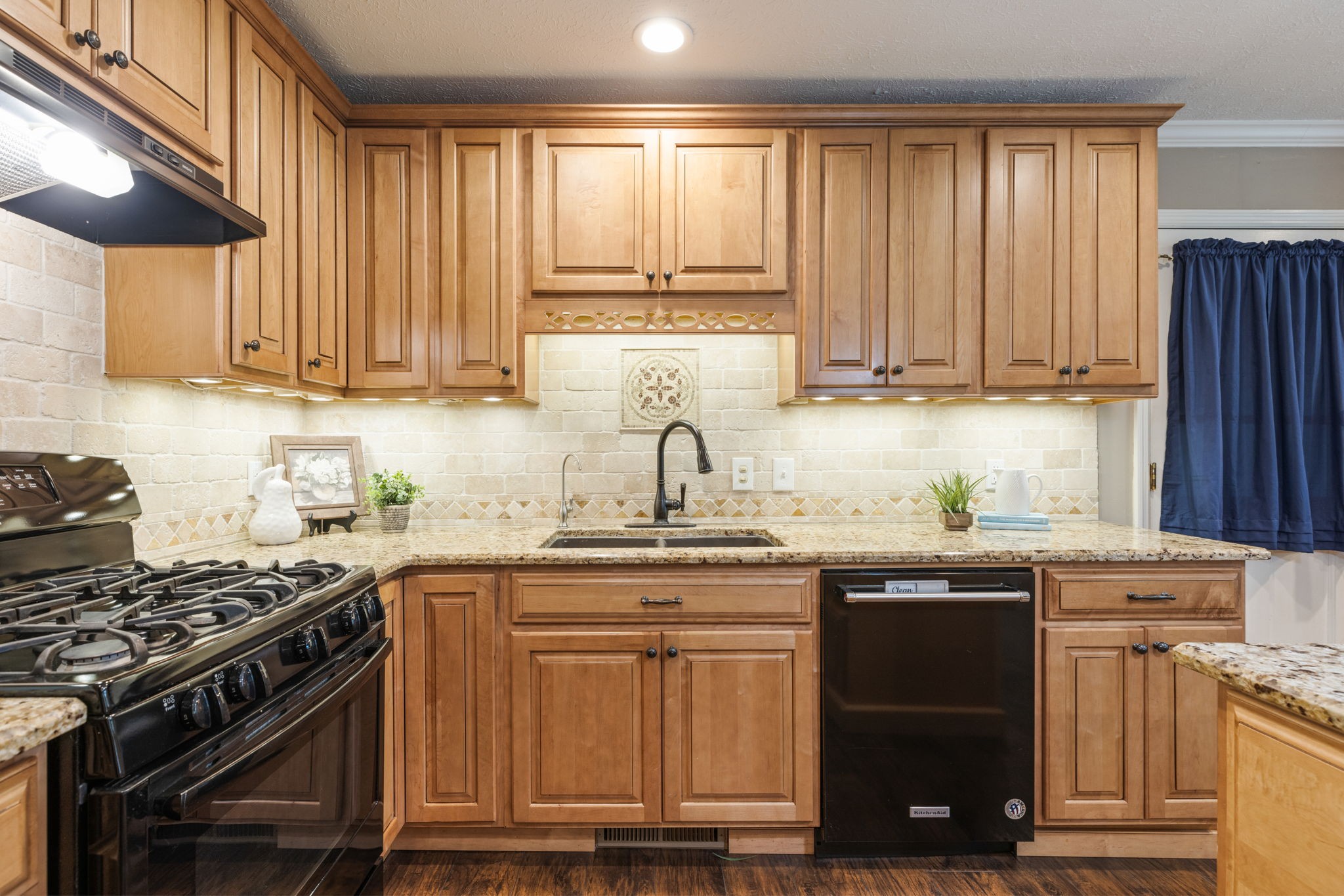 7367 Crow Cut Road Fairview, TN 37062 - Photo 30 of 96 a kitchen with a sink a stove and cabinets