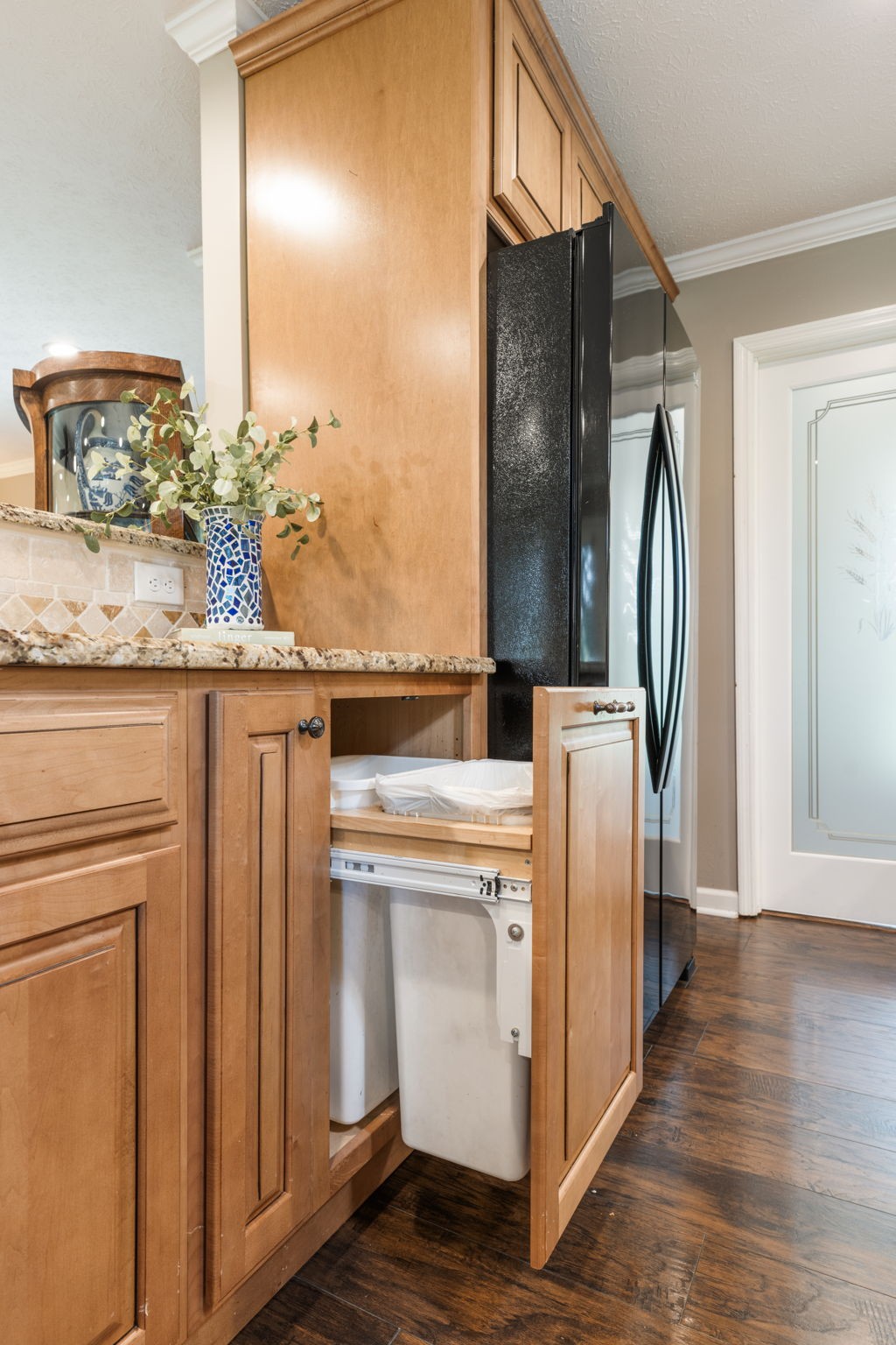 7367 Crow Cut Road Fairview, TN 37062 - Photo 39 of 96 a view of kitchen with stainless steel appliances granite countertop cabinets and wooden floor