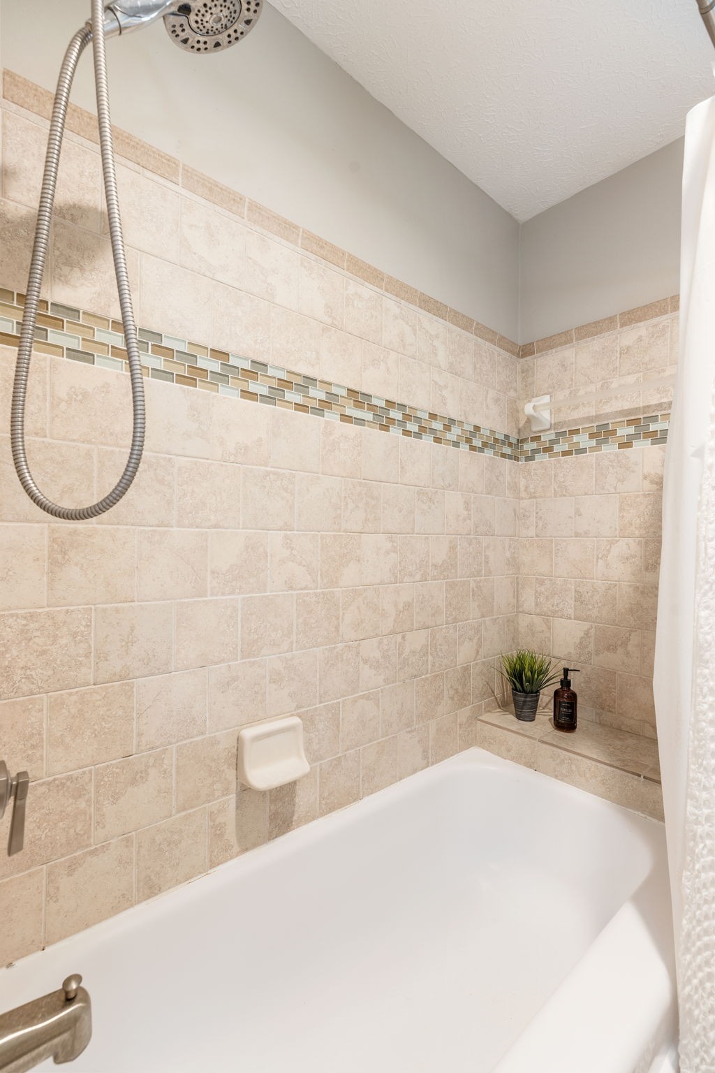 7367 Crow Cut Road Fairview, TN 37062 - Photo 42 of 96 a bathroom with a bathtub and a shower