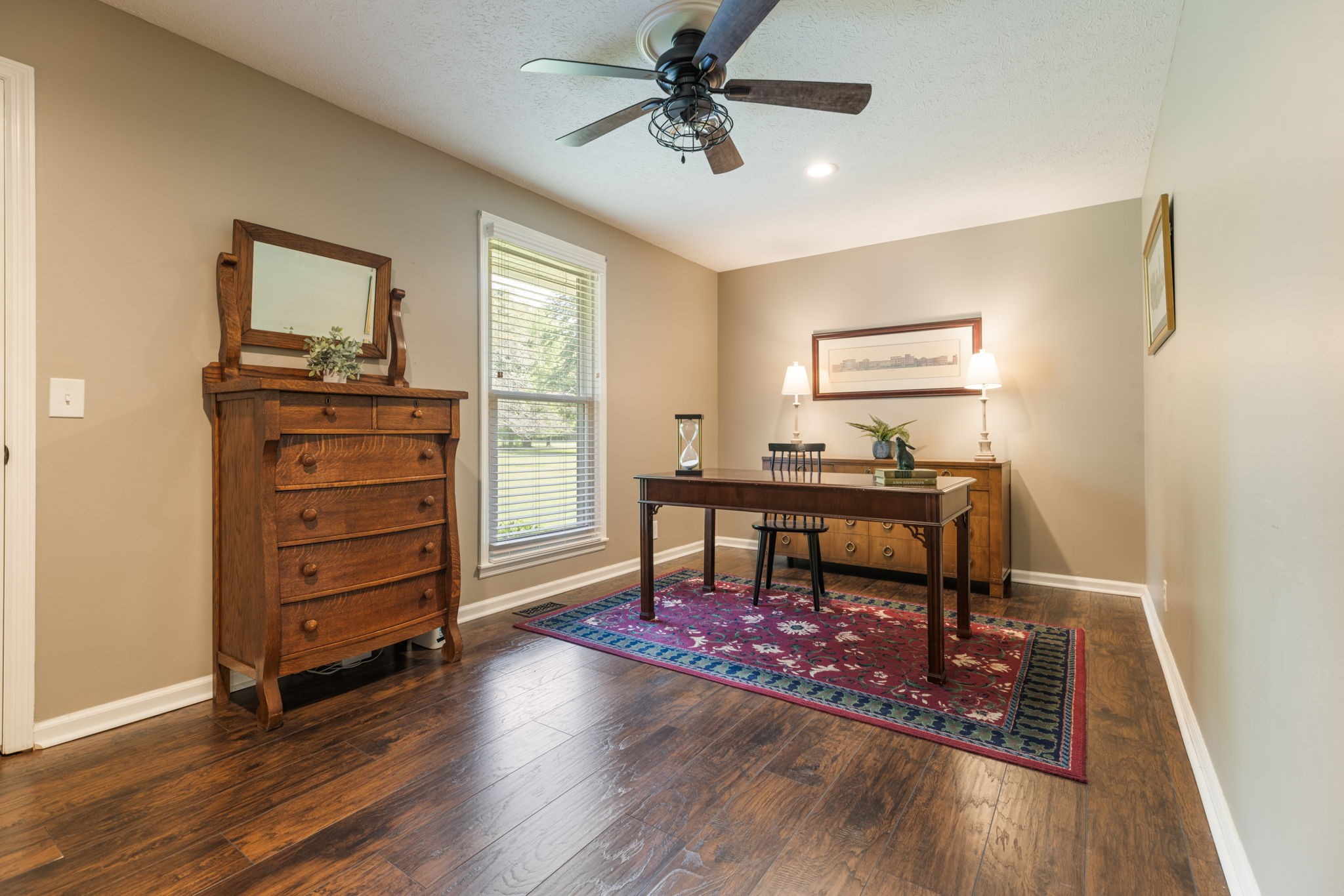 7367 Crow Cut Road Fairview, TN 37062 - Photo 45 of 96 a living room with furniture and a dresser