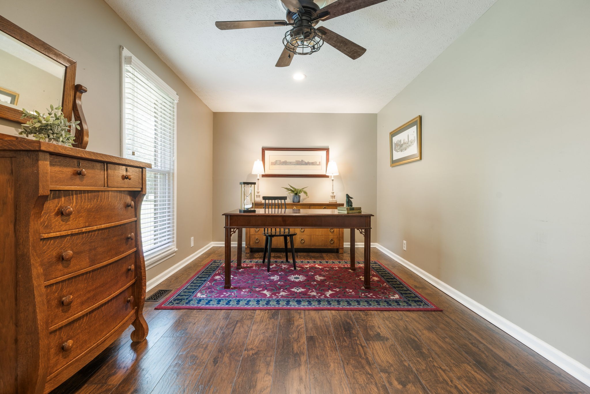 7367 Crow Cut Road Fairview, TN 37062 - Photo 46 of 96 a living room with furniture and a wooden floor