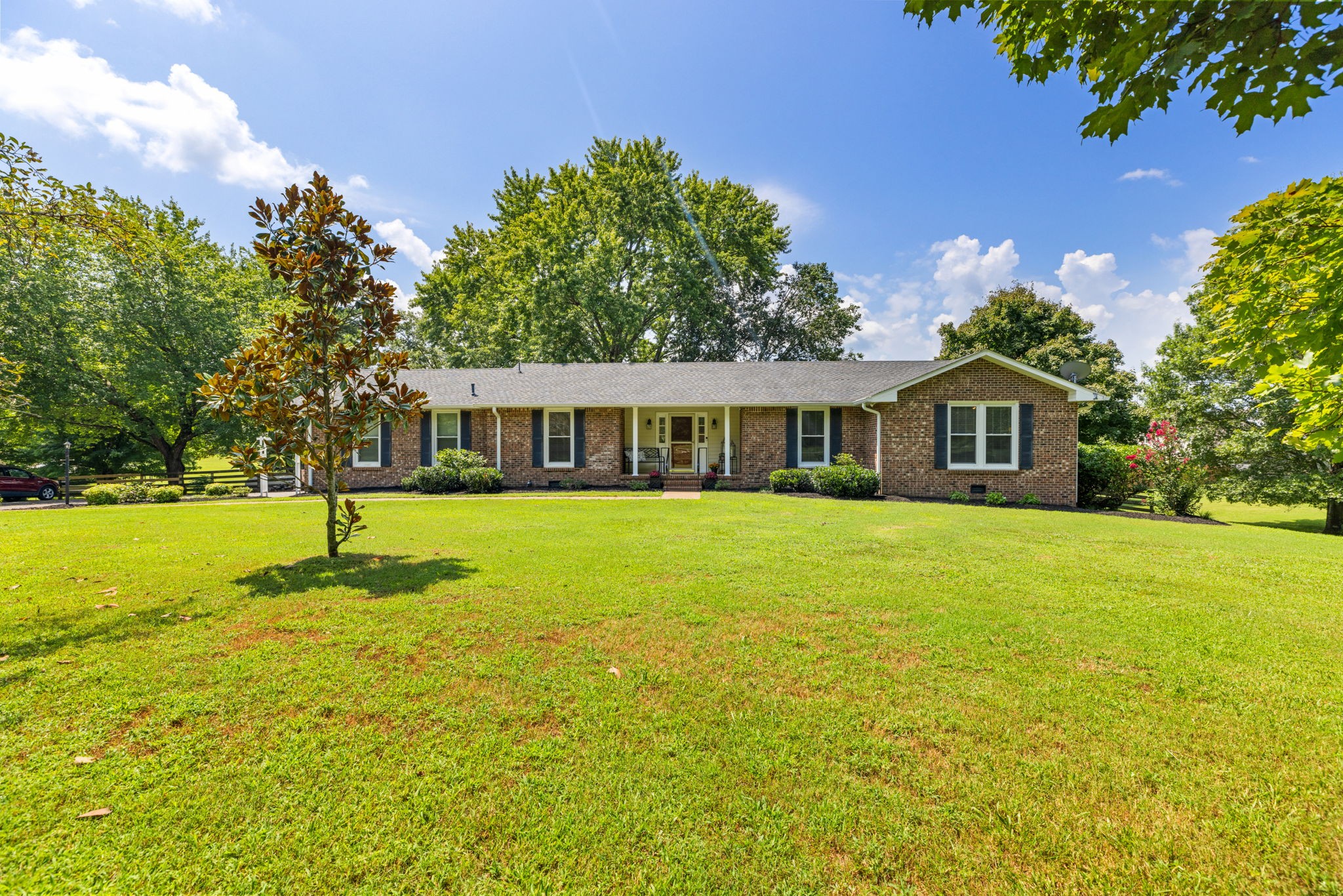 7367 Crow Cut Road Fairview, TN 37062 - Photo 5 of 96 a front view of house with yard and green space