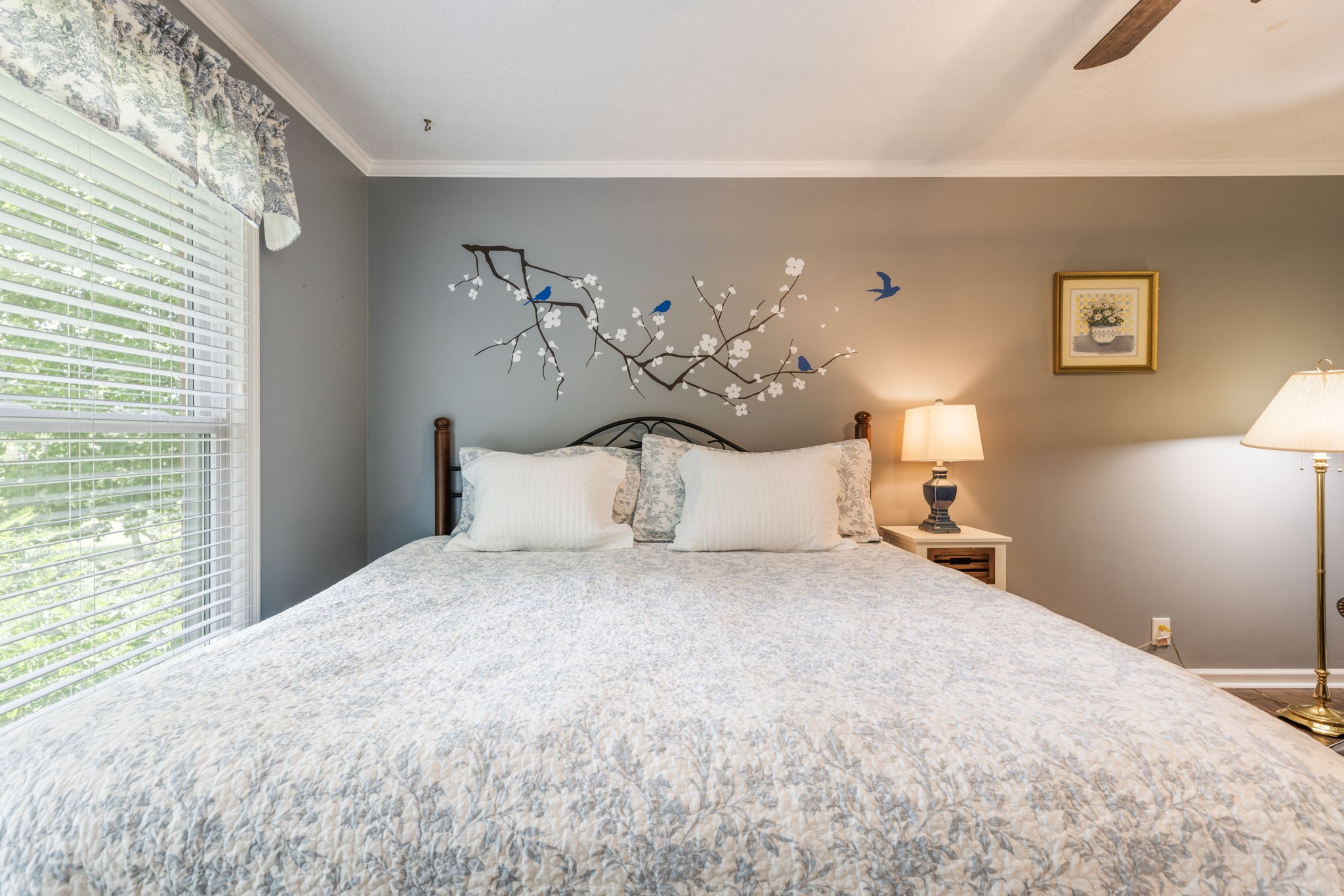 7367 Crow Cut Road Fairview, TN 37062 - Photo 52 of 96 a large bed sitting in a bedroom next to a window