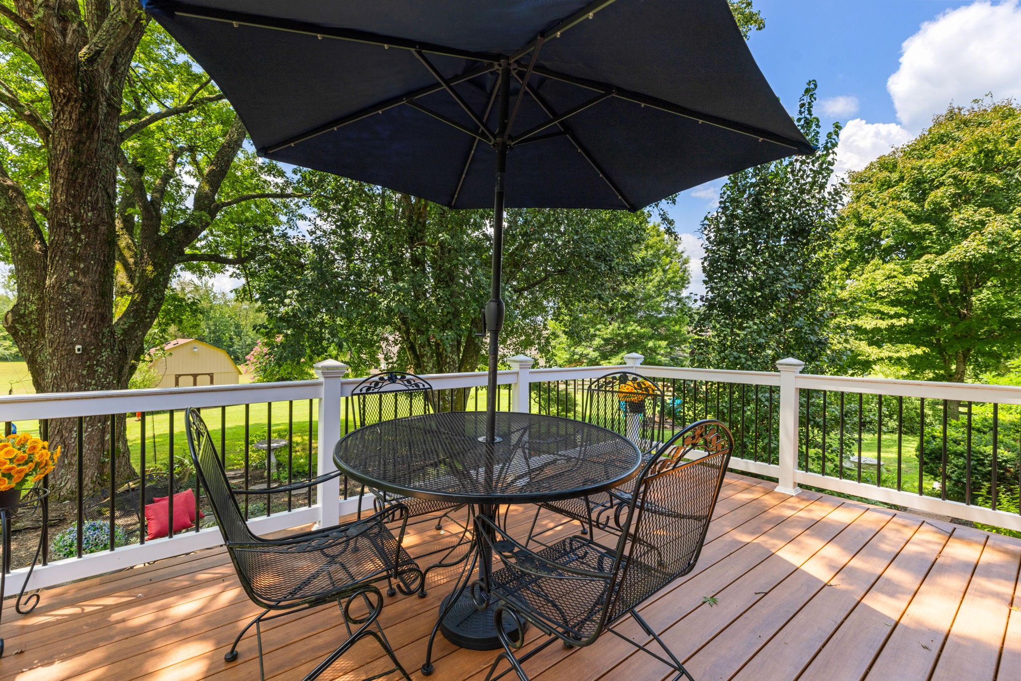 7367 Crow Cut Road Fairview, TN 37062 - Photo 60 of 96 a view of a balcony with furniture and wooden deck