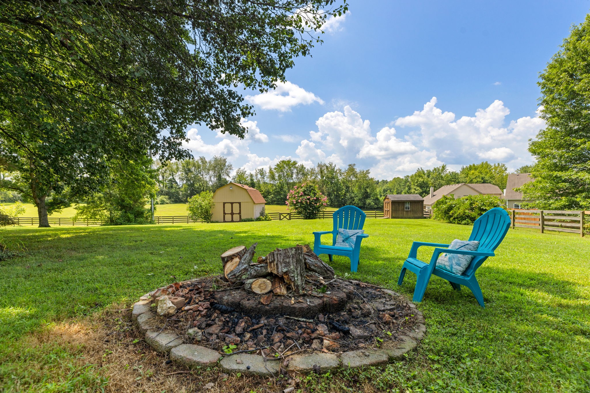 7367 Crow Cut Road Fairview, TN 37062 - Photo 65 of 96 a view of a table and chairs in the garden