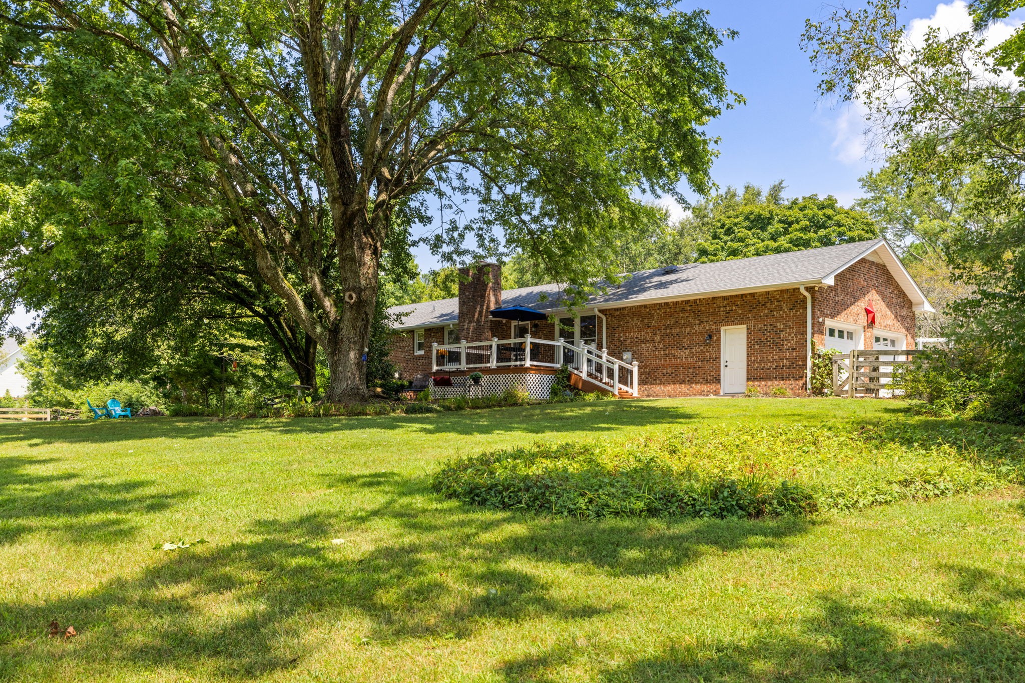 7367 Crow Cut Road Fairview, TN 37062 - Photo 72 of 96 a view of a house with a big yard and large trees