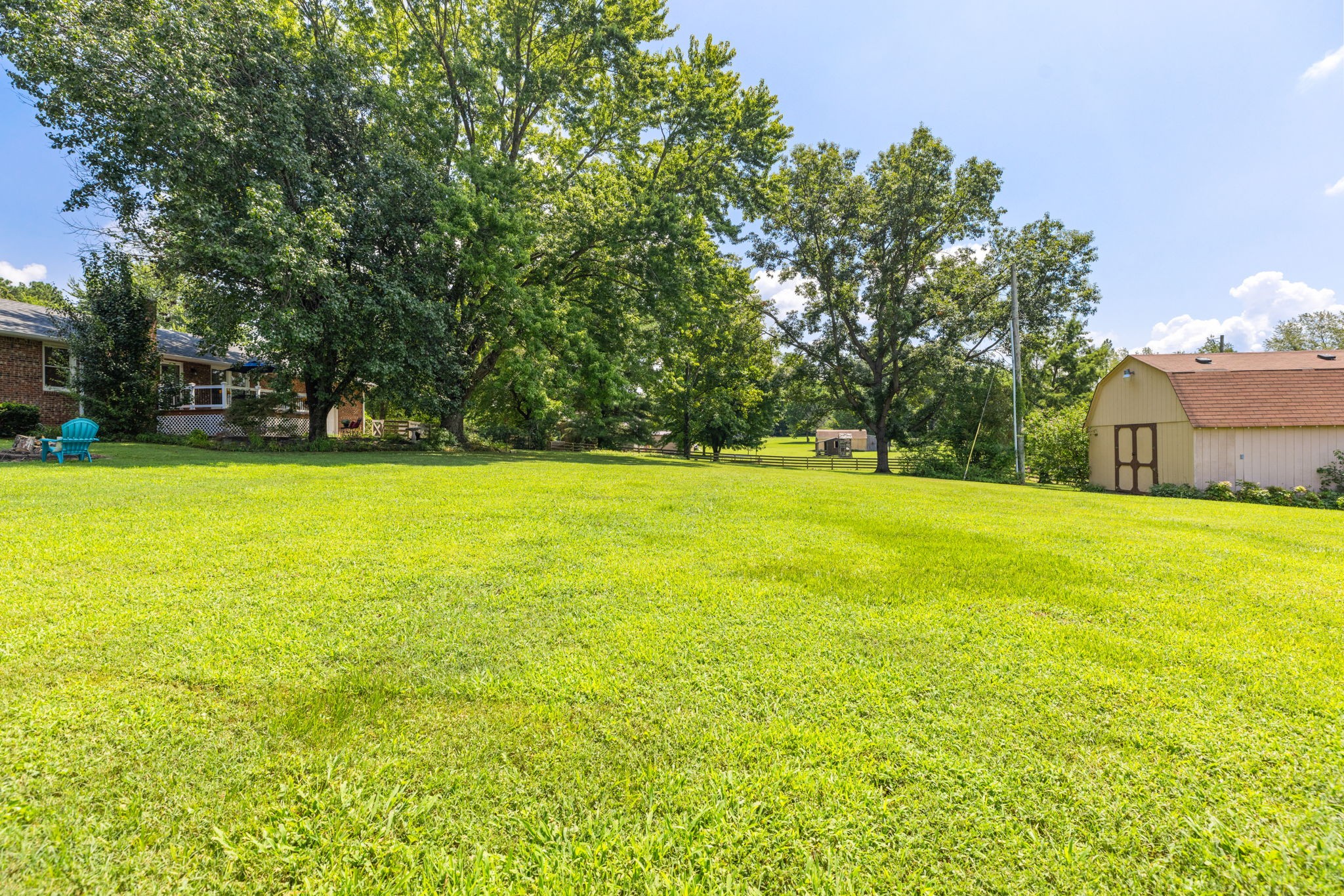 7367 Crow Cut Road Fairview, TN 37062 - Photo 77 of 96 a view of a swimming pool with an outdoor space and seating area