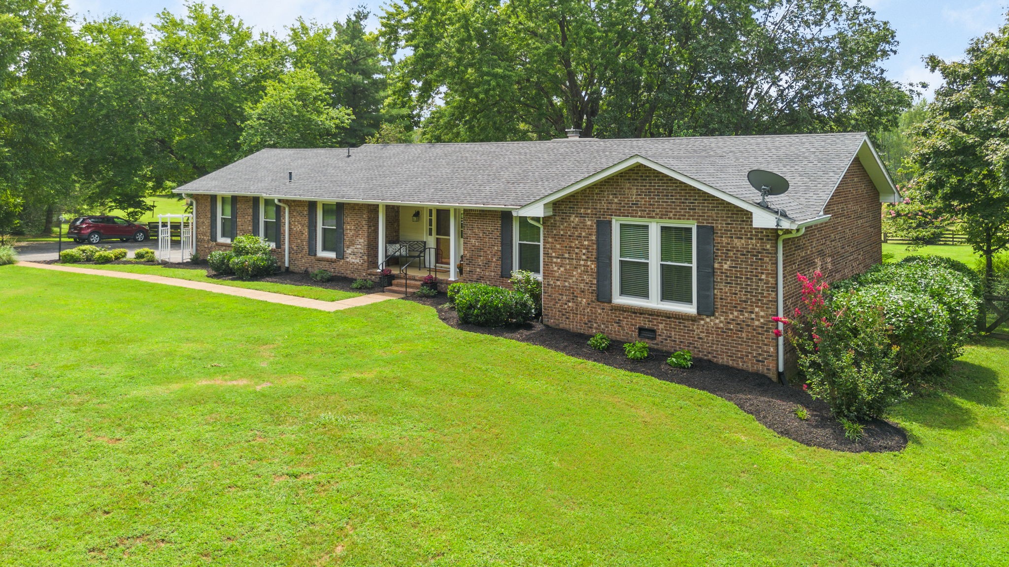 7367 Crow Cut Road Fairview, TN 37062 - Photo 86 of 96 a front view of a house with a yard