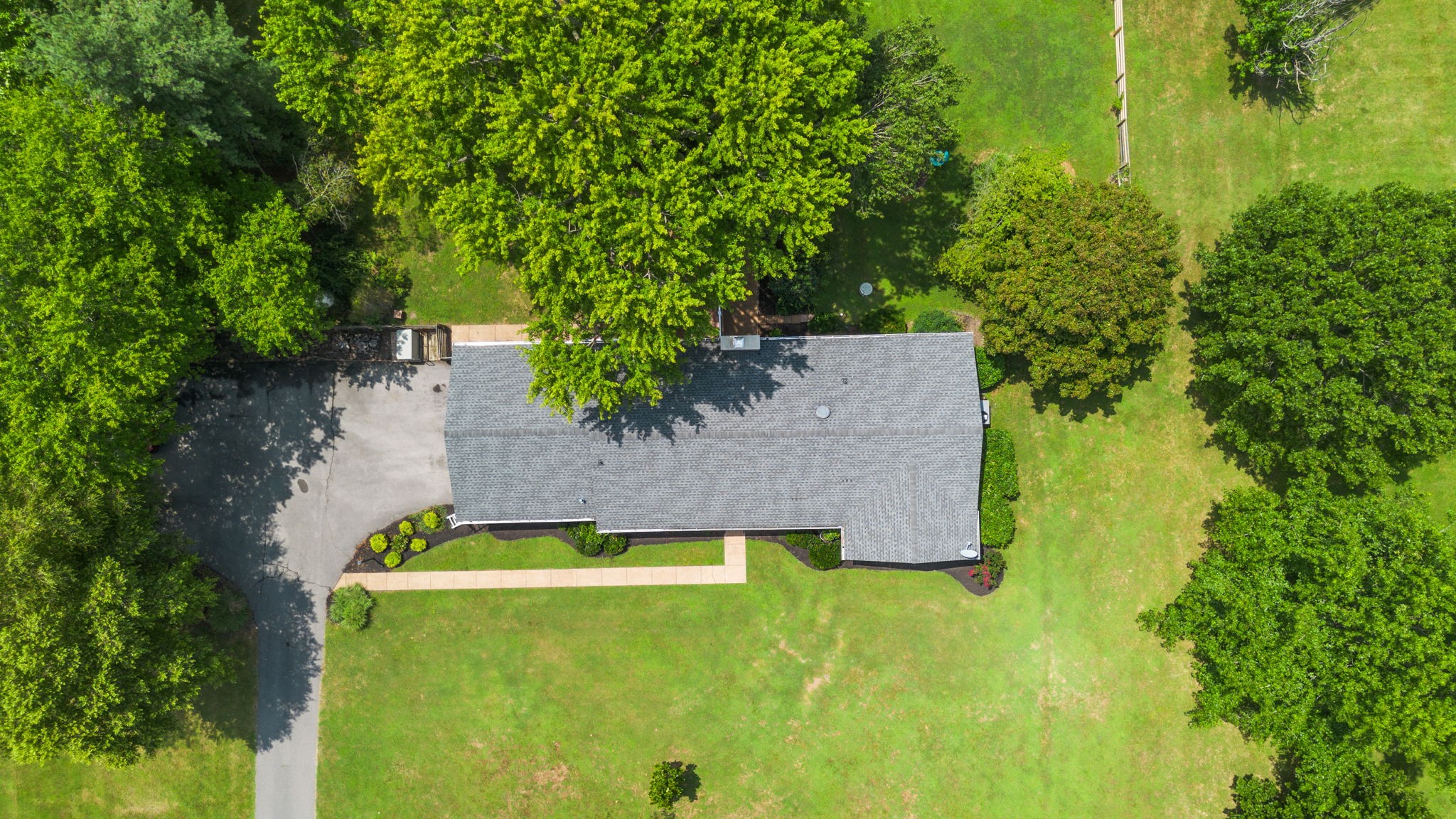 7367 Crow Cut Road Fairview, TN 37062 - Photo 88 of 96 an aerial view of a house with swimming pool and yard