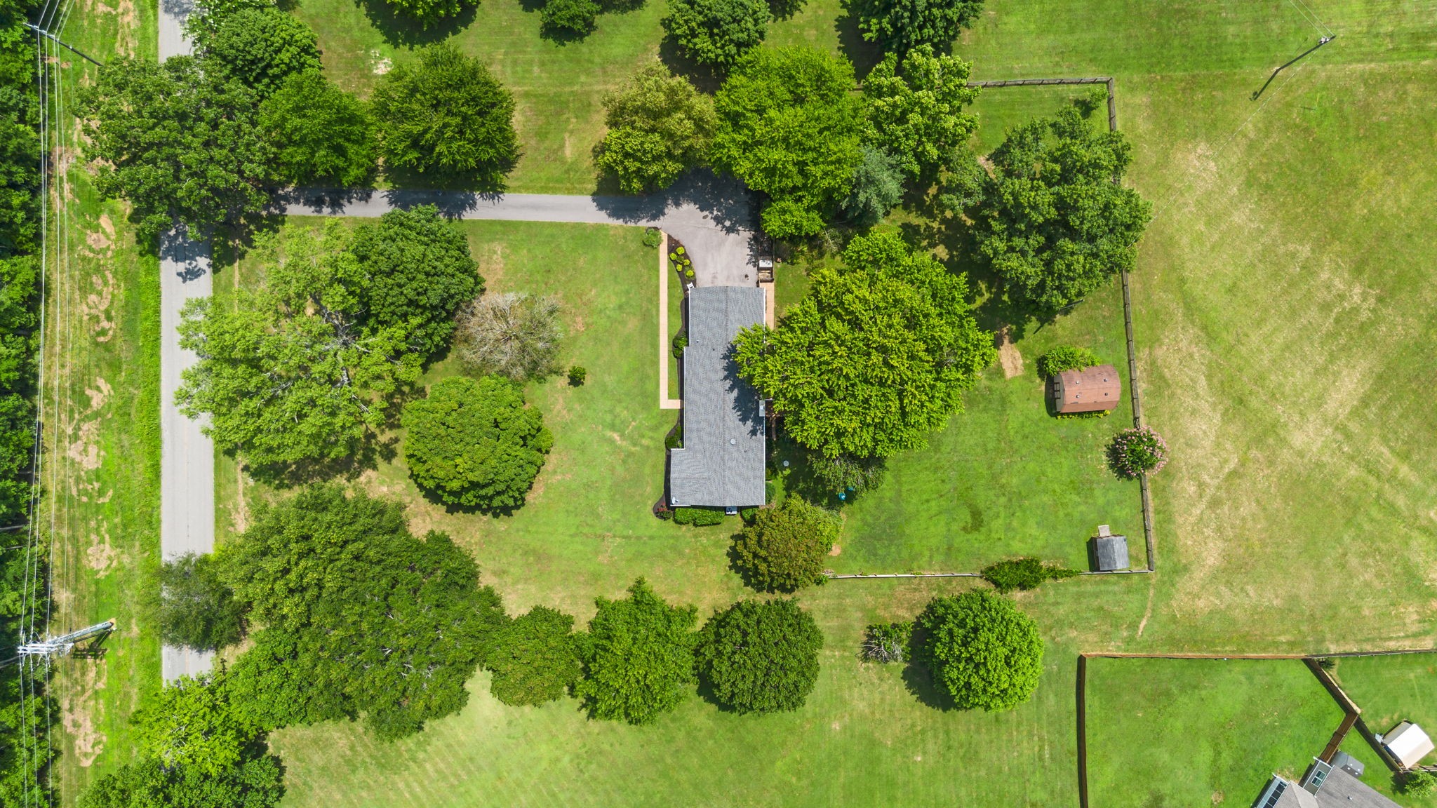 7367 Crow Cut Road Fairview, TN 37062 - Photo 89 of 96 an aerial view of a house with a yard