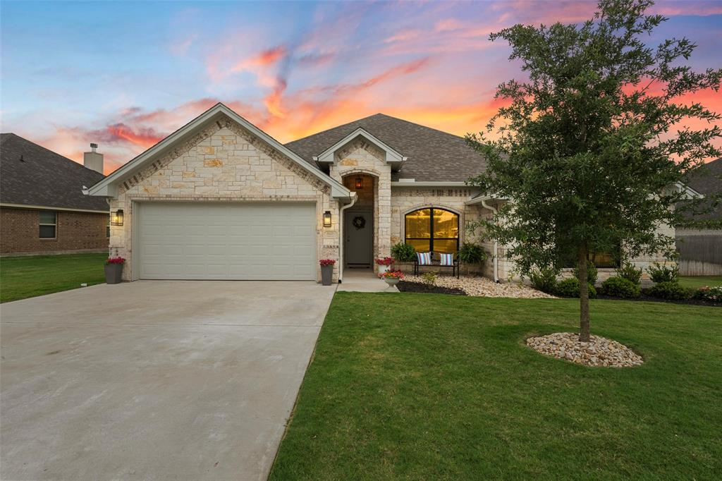 828 Agile Street Hewitt, TX 76643 - Photo 1 of 30 a front view of a house with garden