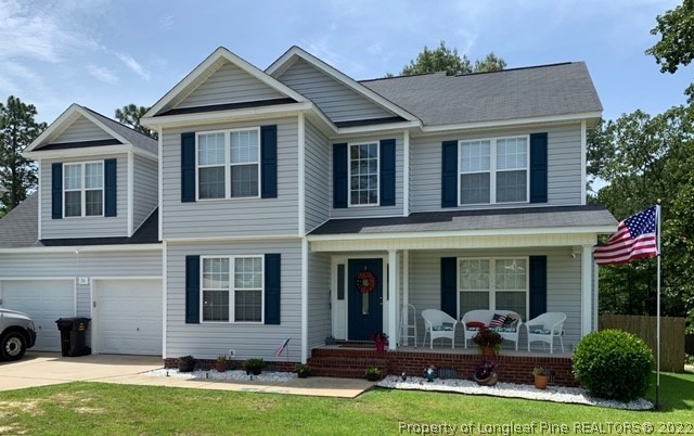 56 Rockingham Street Spring Lake, NC 28390 - Photo 1 of 2 front view of a house with a yard