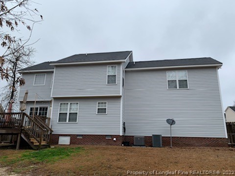 56 Rockingham Street Spring Lake, NC 28390 - Photo 2 of 2 a front view of a house with garden