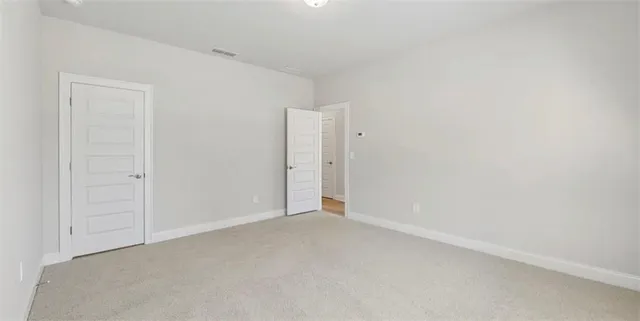 an empty room with an entryway